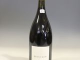 a bottle of wine that is sitting on a counter