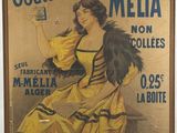 une vieille affiche représentant une femme en robe jaune tenant une cigarette
