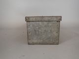 a small metal box that is sitting on a table