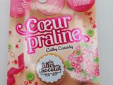 a book with a picture of cupcakes and cookies on it