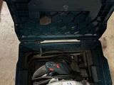a tool box with tools inside of it on the floor