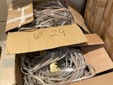 two boxes with wires in them sitting on the floor