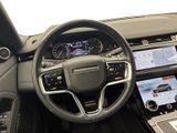 the interior of a car with a steering wheel, dashboard, and touch screen