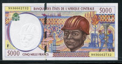 a close up of a currency note with a picture of a man wearing a hard hat