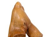 pair of wooden shoes on a white surface with a white background