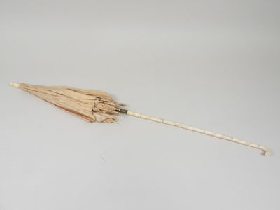 an umbrella that has been left on the floor