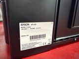 a label on the side of a refrigerator that says epson