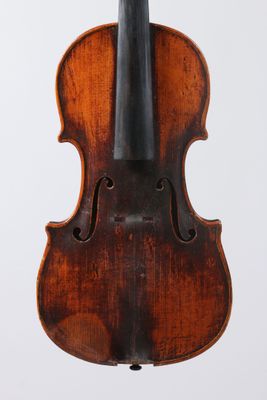 an old violin with a bow on a white background