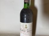 a bottle of wine that is sitting on a table