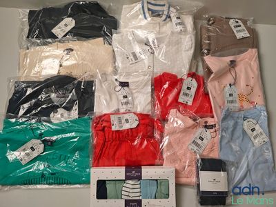 a lot of men ' s clothing on display in a box