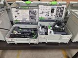 many different types of electronic equipment on a table