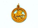 une pièce d'or sur laquelle figure l'effigie d'un homme à cheval