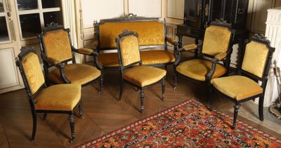 six chairs in a room with a rug on the floor