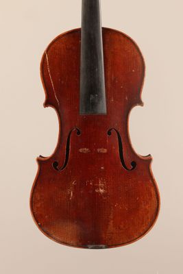 an old violin with a bow on a white background