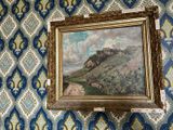 une image d'un tableau accroché au mur d'une pièce
