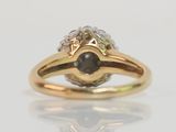 an image of a ring with a black diamond in it