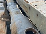 a large pipe on the side of a building