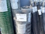 many rolls of plastic mesh on the shelf