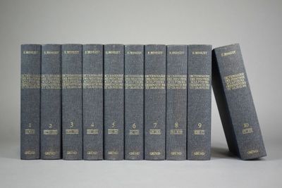 six livres sont empilés sur une surface blanche
