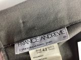 a close up of a label on a grey jacket