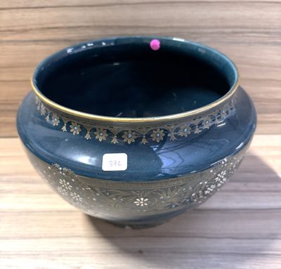Cache pot en faïence émaillé à motif floral (ouverture) H 21…