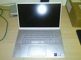 a laptop computer that is sitting on a desk