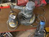 a picture of a sander sitting on top of a table