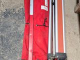 a pair of skis and a pair of ski poles on the ground