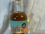 a bottle of rum that is sitting on a table