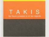 a yellow and black book with the words takis on it
