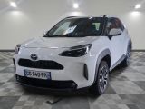 the white toyota c - hr suv is parked in the garage