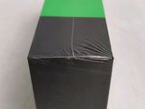 a black box with a green strip on it