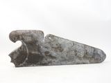 an old, rusty knife with a large blade sticking out of it ' s side