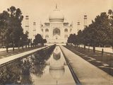 a black and white photo of an old picture of a taj mahal