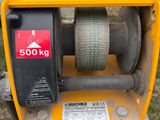 a machine that is sitting in the grass