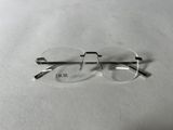a close up of a pair of glasses on a table