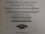an old book with a black and white title on it