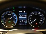 a close up of a car dashboard with a speedometer and gauges