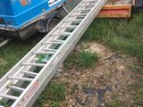 a truck that is parked next to a ladder