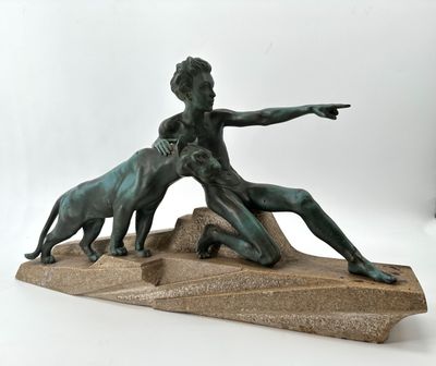 statue of a man and a dog on a rock with a white background