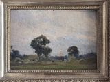une peinture à l'huile d'un paysage avec des arbres dans un cadre doré