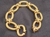 bracelet plaqué or avec un maillon et un fermoir