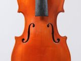 an orange violin with a black bow on a white background