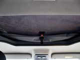 the interior of a car with the sunroof down and the sunroof down