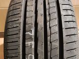 a close up of a tire on a table with a box in the background