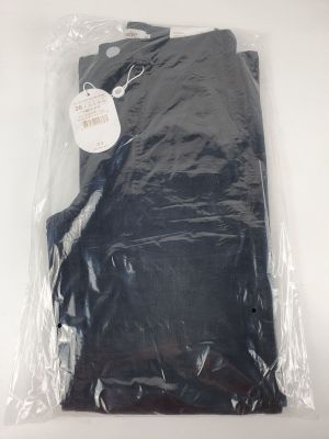 the black shirt is wrapped in plastic and ready to be shipped