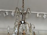 a chandelier hanging from the ceiling in a room