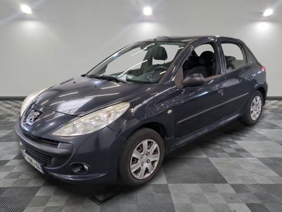 a picture of a blue car parked in a garage