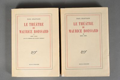 two books sitting on top of a table next to each other