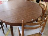 many chairs and a table in a room
